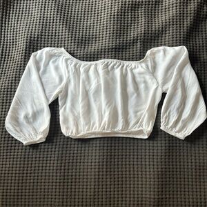 Show Me Your Mumu off the shoulder crop.